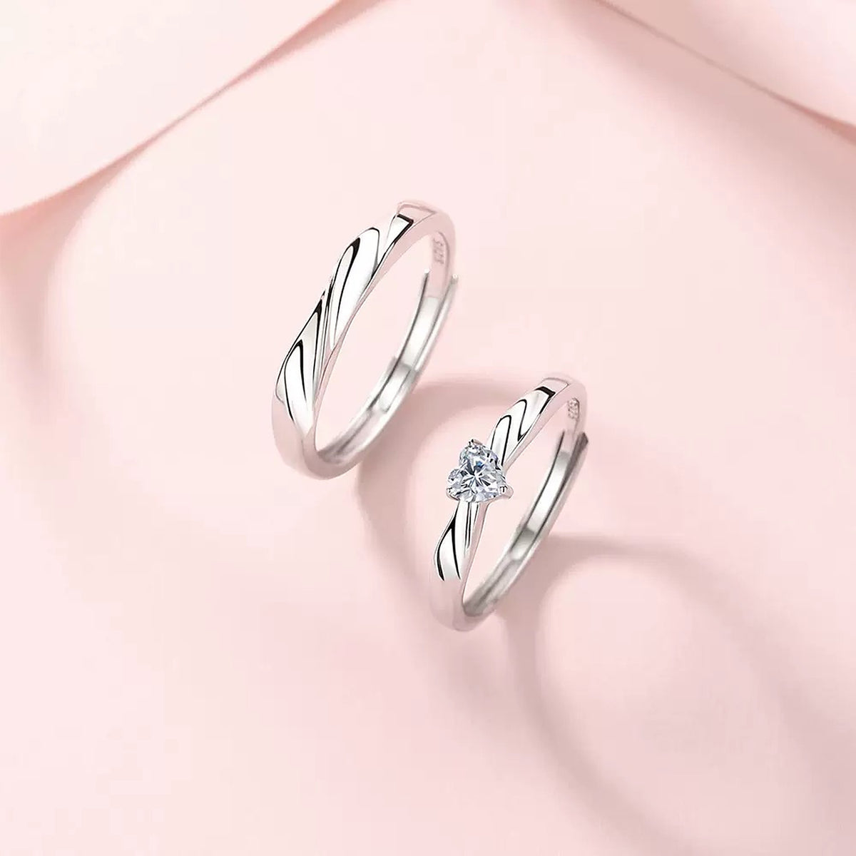 Eternal Flow Couple Ring, two adjustable S925 sterling silver rings with flowing lines on soft pink