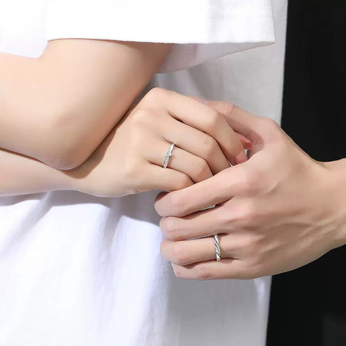 Eternal Flow Couple Ring worn by a couple with their hands together, adjustable S925 sterling silver rings