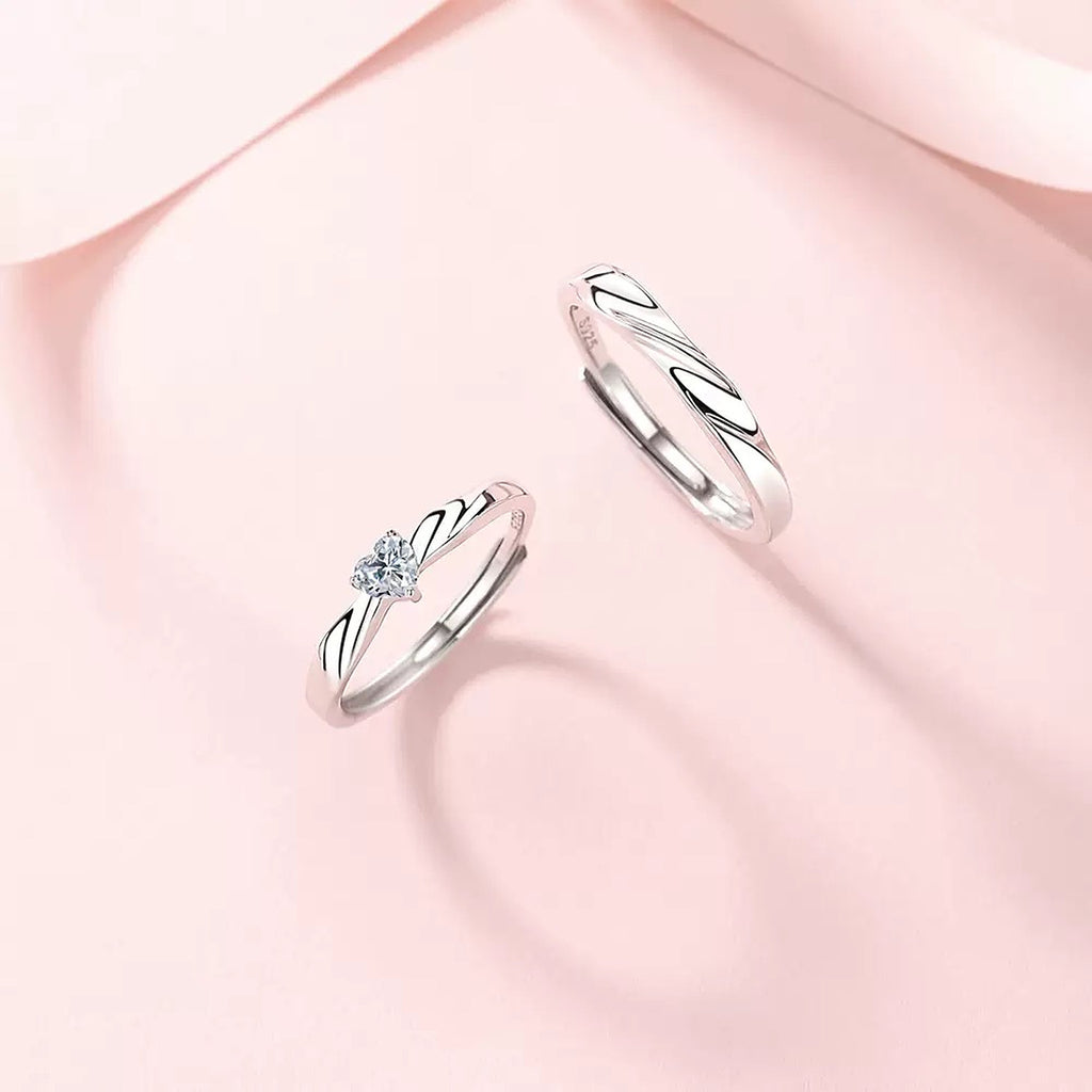 Eternal Flow Couple Ring, heart-shaped stone ring and matching plain band, second angle on pink