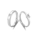 Pure Promise Ring Set, heart-shaped stone ring with a matching polished band set with a small round stone, on a white background
