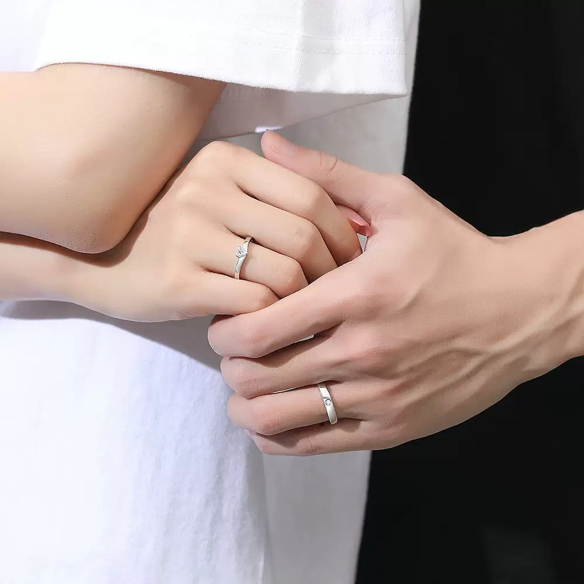 Pure Promise Ring Set worn by a couple with their hands together, adjustable S925 sterling silver rings