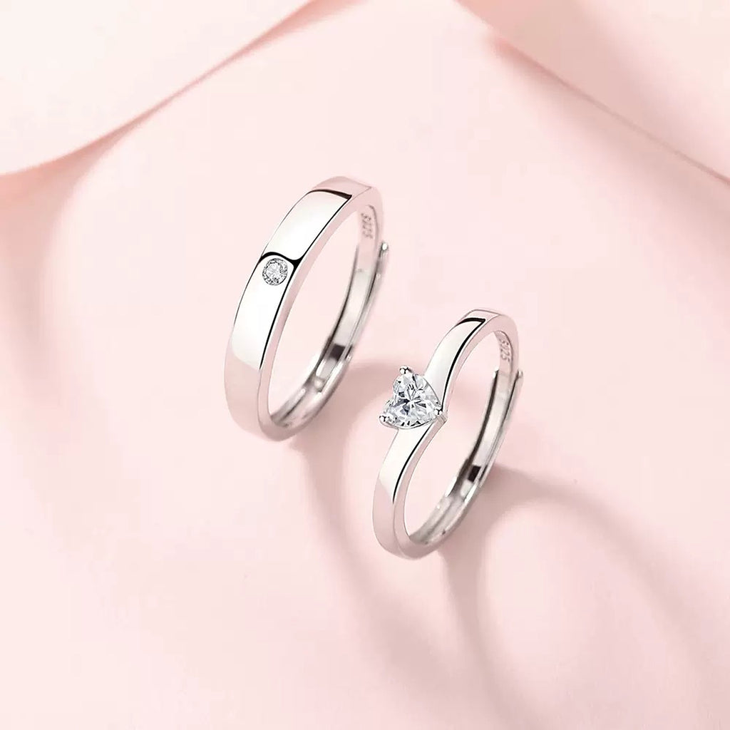 Pure Promise Ring Set, heart-shaped stone ring and matching band on soft pink
