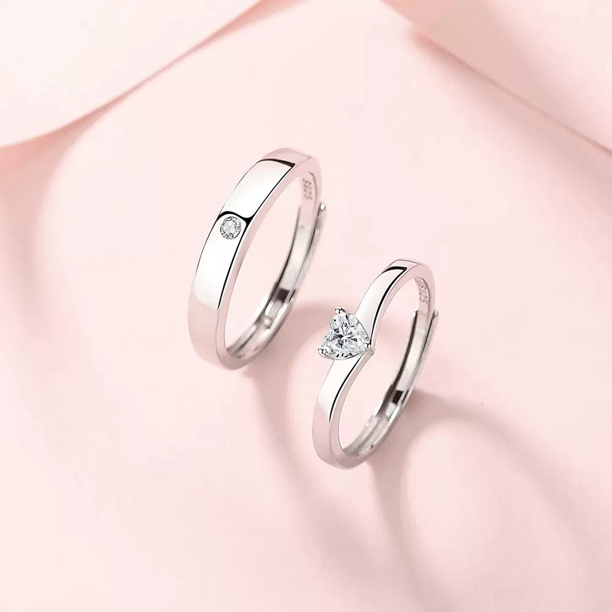 Pure Promise Ring Set, heart-shaped stone ring and matching band on soft pink
