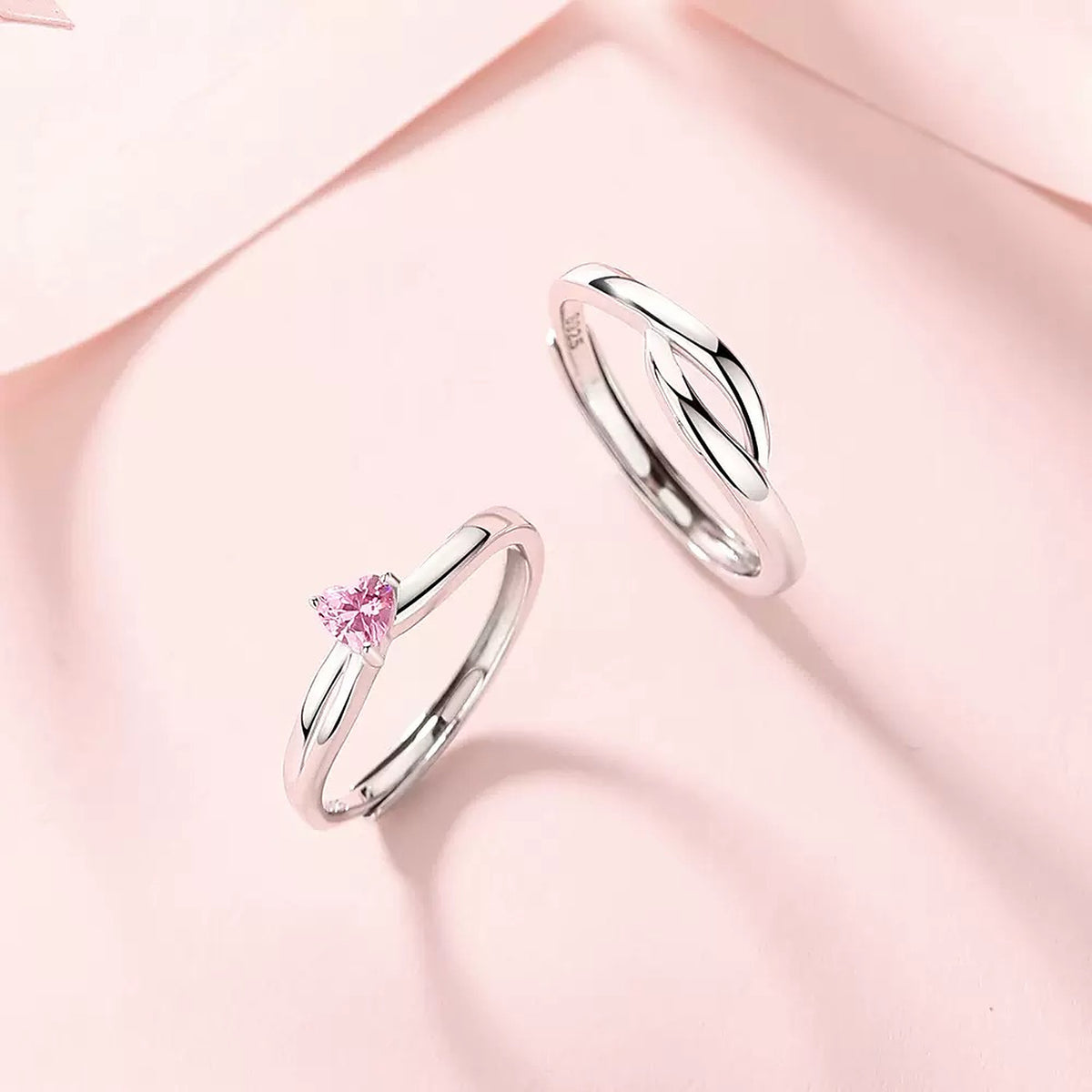 Pure Promise Ring Set in Blush Pink, pink heart-shaped stone ring and matching band on soft pink