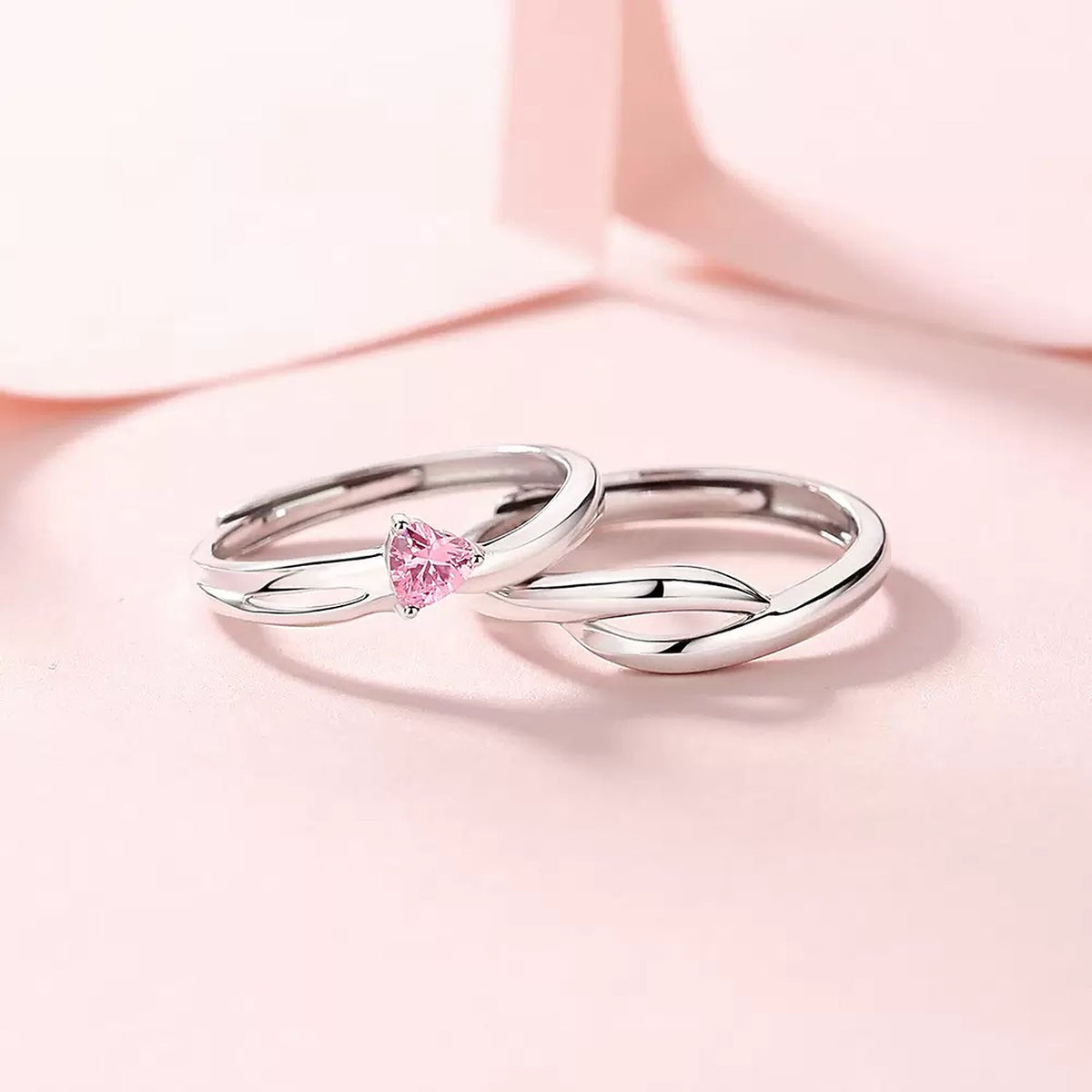 Pure Promise Ring Set in Blush Pink, pink heart-shaped stone ring and matching band, second angle on soft pink