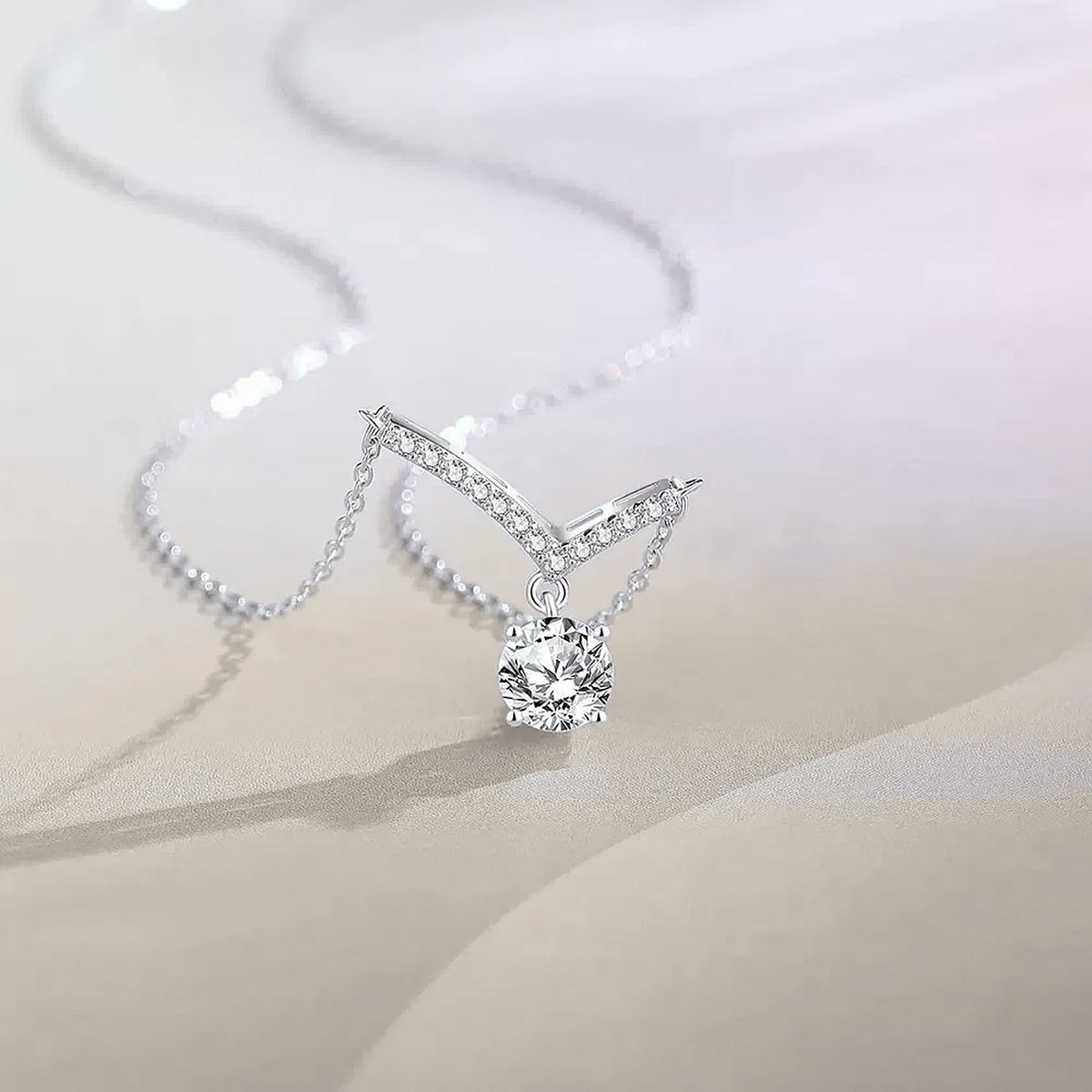 Aurora V Moissanite Necklace, V-shaped necklace with a single round moissanite on a fine silver chain