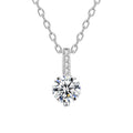 Luna Solitaire Moissanite Necklace, round moissanite pendant with a bar of four small stones on a white background